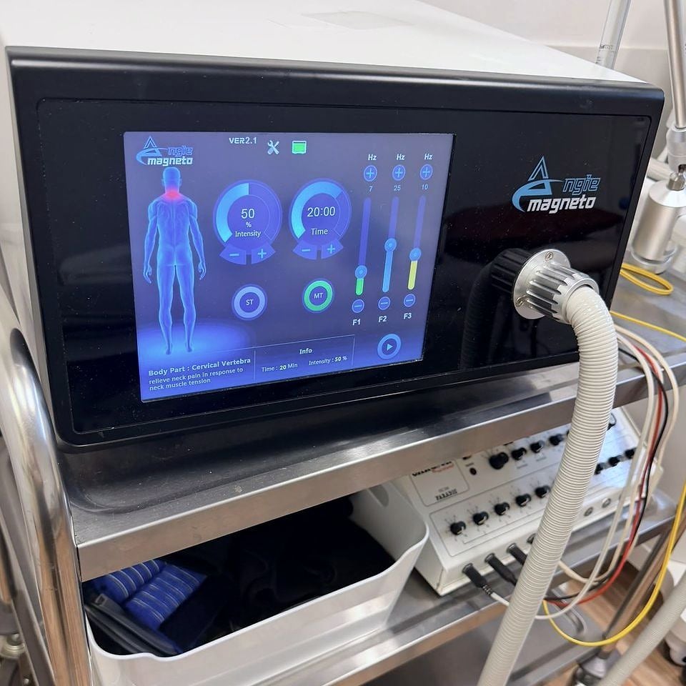 The Angie Magneto pulsed electromagnetic field unit at PRC Clinic, set for the cervical spine.